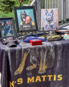 K9 Mattis portraits displayed at the Michigan War Dog Memorial
